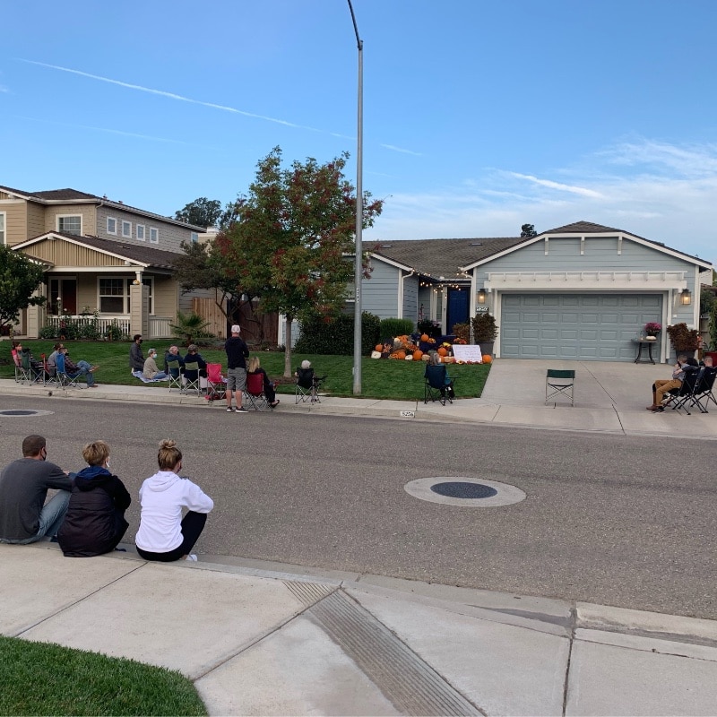 Neighbors and families waiting for the Driveway Drive-By Recital to begin. composecreate.com 
