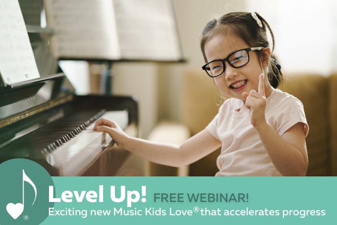 Free Webinar: Level Up! | A smiling child piano student is at the piano, with one hand on the keys, and the other hand gesturing "#1!" | ComposeCreate.com