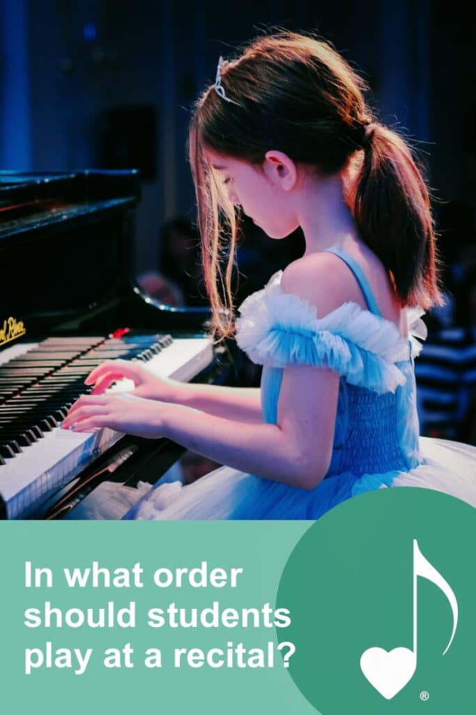 What Order Should Students Play at a Recital - a handy guide to the most common and most creative ways to determine program order | ComposeCreate.com | The image is of a little girl at a piano in a fancy dress and tiara playing her piano recital piece for an audience.
